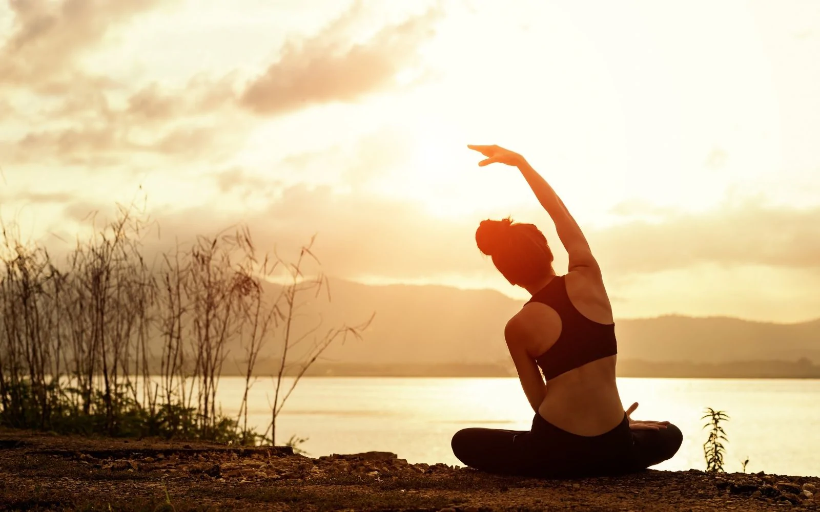 Sunrise yoga by the water